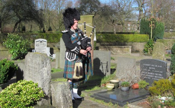 Bagpipe player at funeral