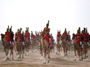 A haunting peal reminiscent of the Scottish Highlands reverberates across Pakistan's inhospitable Cholistan desert as something thought to be society's just camel-mounted armed forces bagpipe musical organization marches, noses in the air. PHOTO: AFP