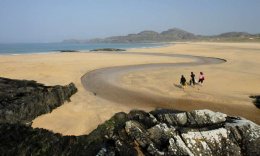 kiddies bodyboarding at Kiloran Bay, Isle of Colonsay