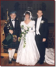 George Balderose with bride and groom