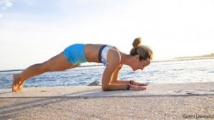 girl demonstrating dolphin plank