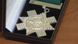 ruce Gandy of Dartmouth won this Silver celebrity medal at a global bagpipe occasion in Scotland.