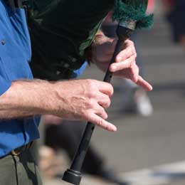 Hands on chanter playing bagpipes