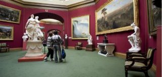 Visitor look upon photographs in nationwide Gallery of Scotland,  Edinburgh